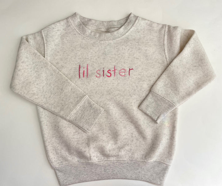 Big or Lil Sister Cream Sweatshirt hand embroidered in ombre pink thread