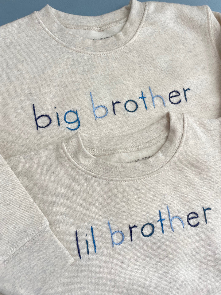 Big or Lil Brother Cream Sweatshirt hand embroidered in ombre blue thread