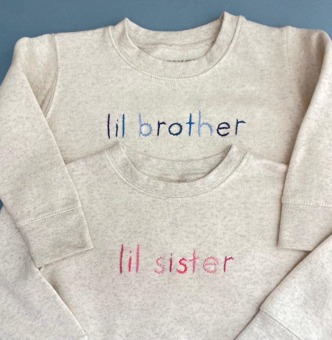 Big or Lil Sister Cream Sweatshirt hand embroidered in ombre pink thread